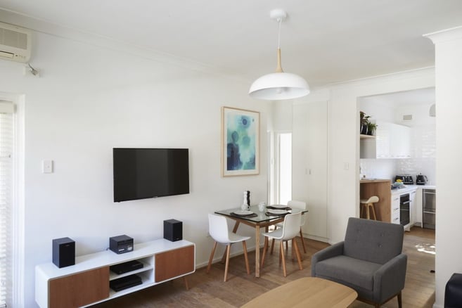 The Scandinavian Chic style apartment had a colour palette of white, pale wood and blue