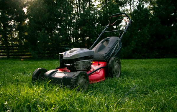 red and black lawn mower