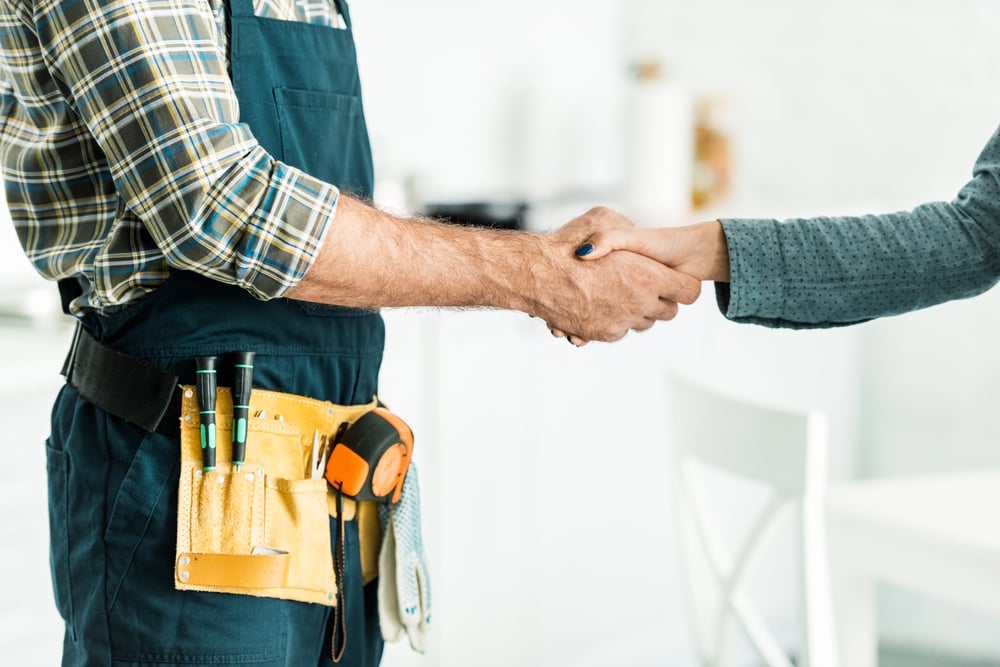 plumber-client-handshake-serviceseeking