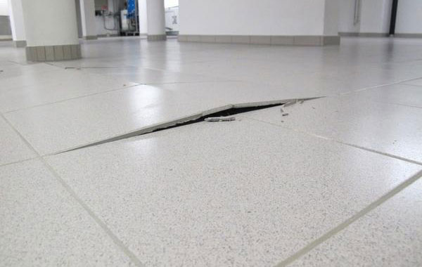 What Causes Floor Tile to Pop Up? | Service Seeking